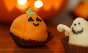 Image of a candy pumpkin and candy ghost. 
