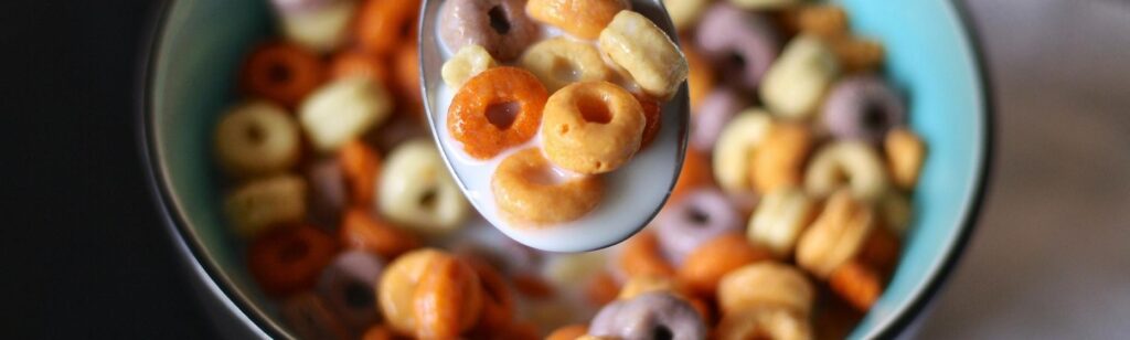 A plate of cereal with milk