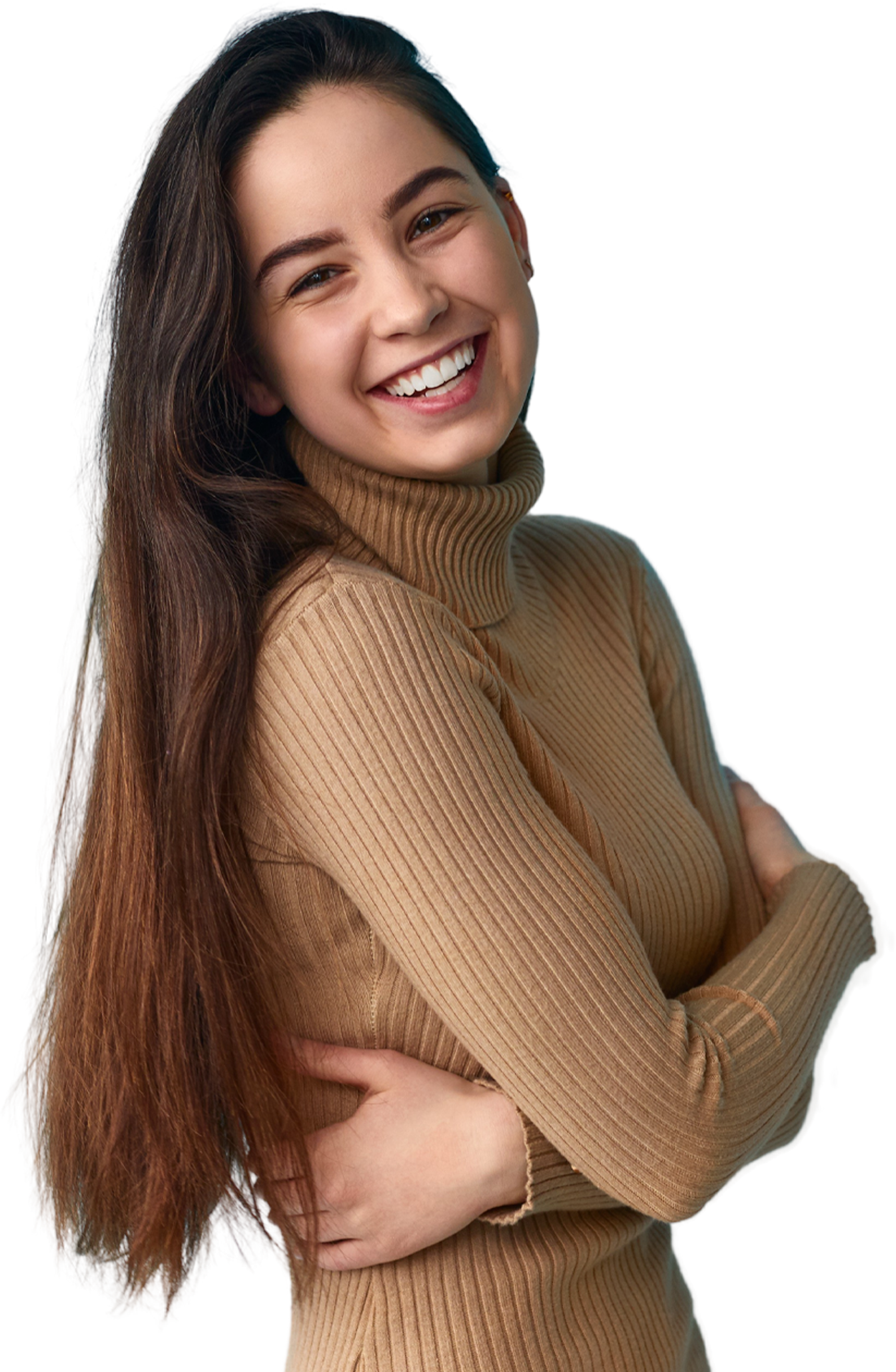Girl with long hair, she is showing her smile after wearing her retainer.