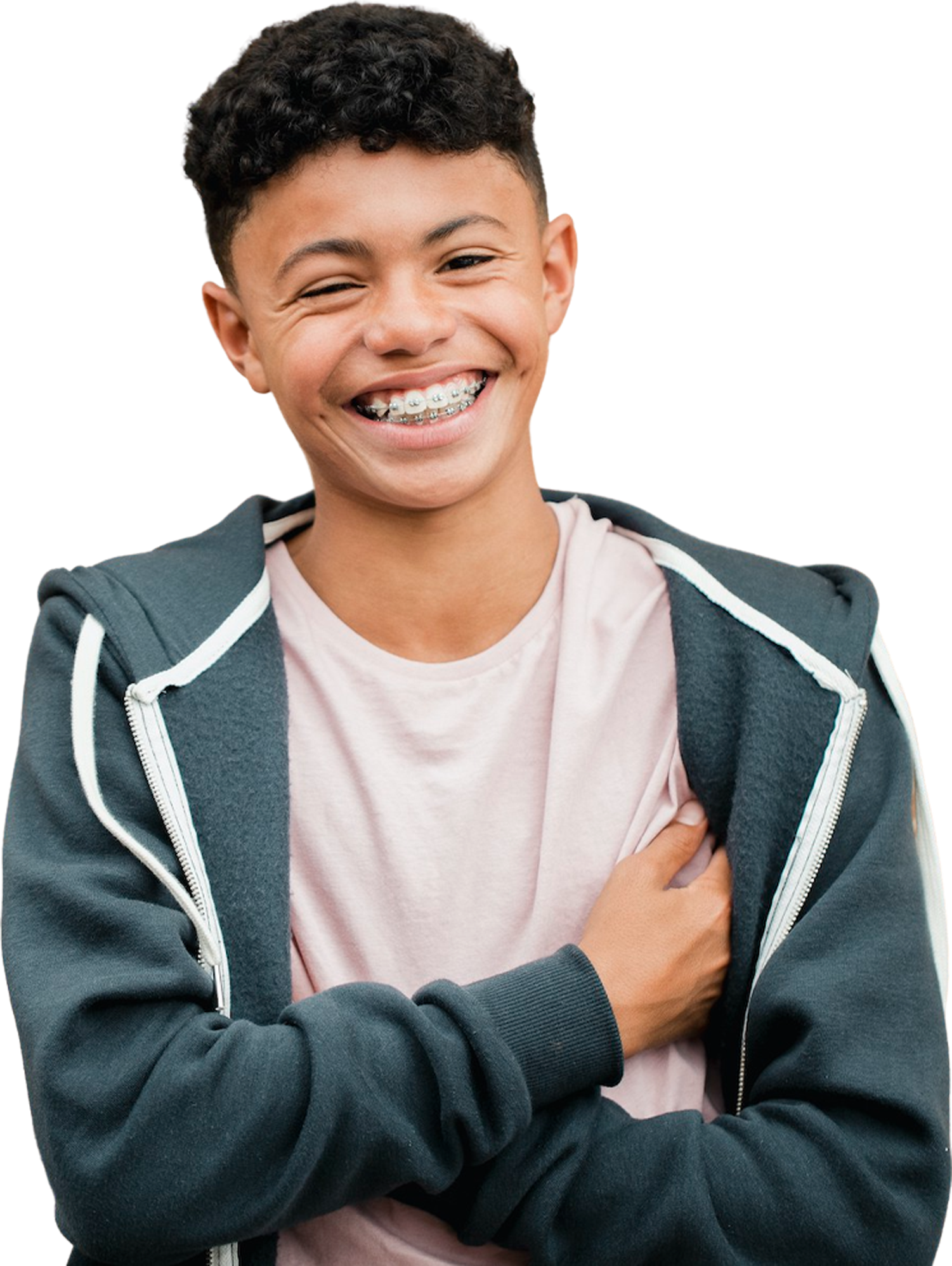 Cutout of a young boy with braces, and he is crossing his arms