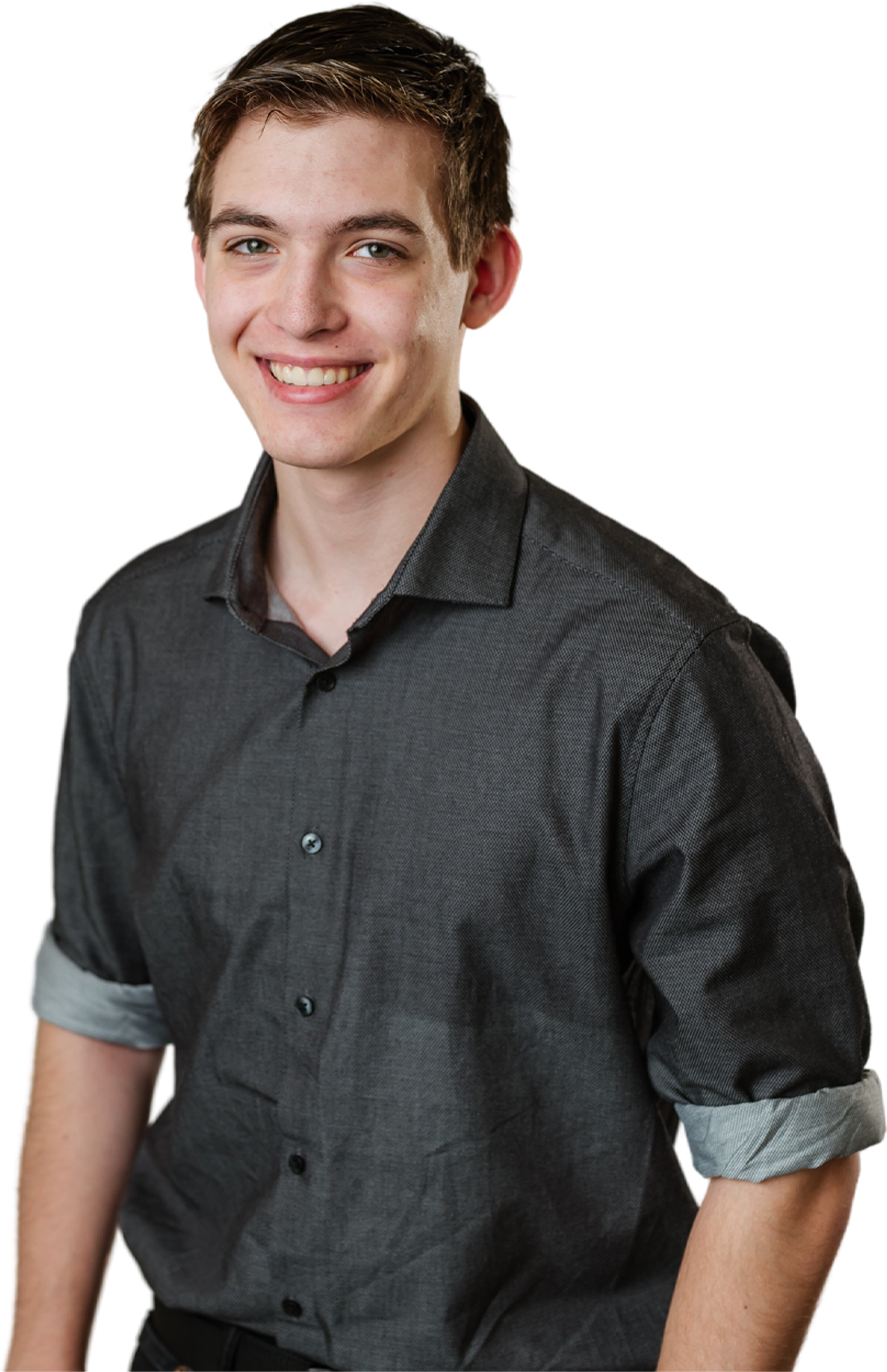 A cutout photo of a young man who is smiling and showing his healthy smile after wearing braces.