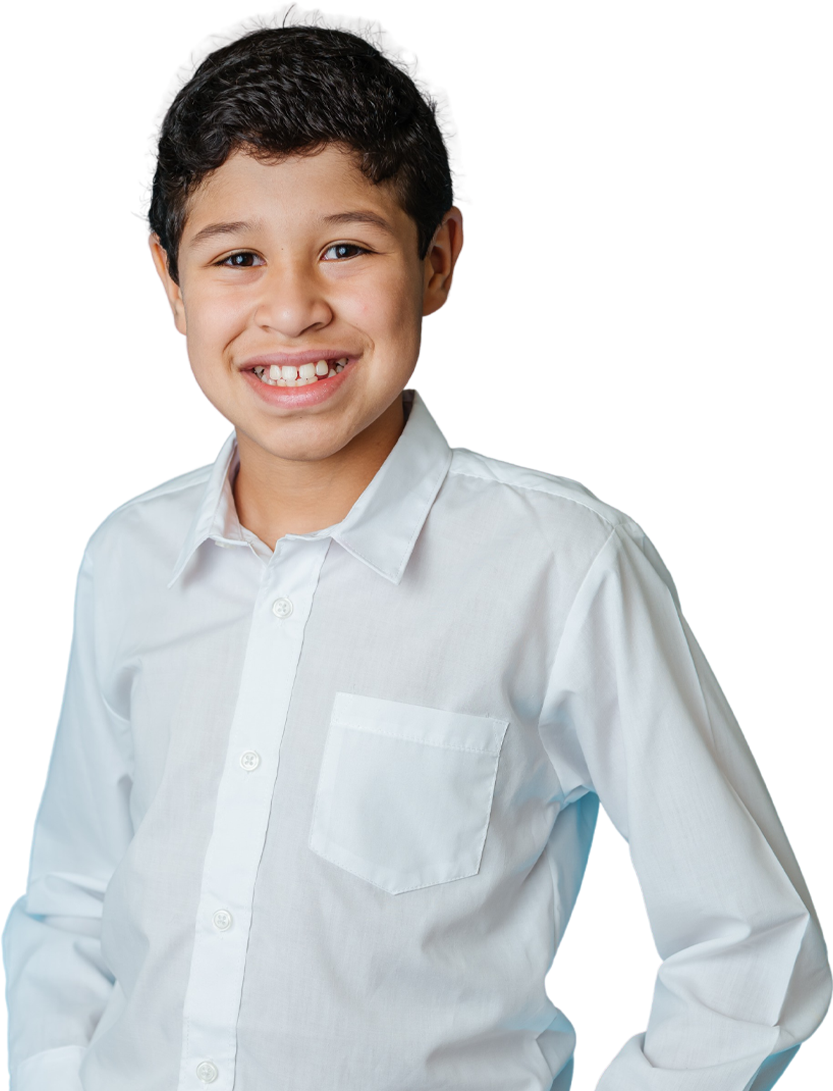 A small boy posing for the camera, and smiling for a photo. He is wearing formal attire.