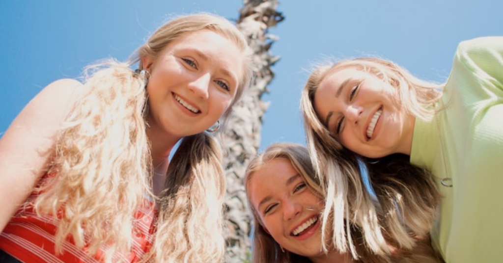 three teens with braces