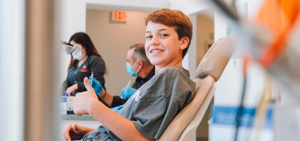 Confident boy having his orthodontic consult without an orthodontist referral