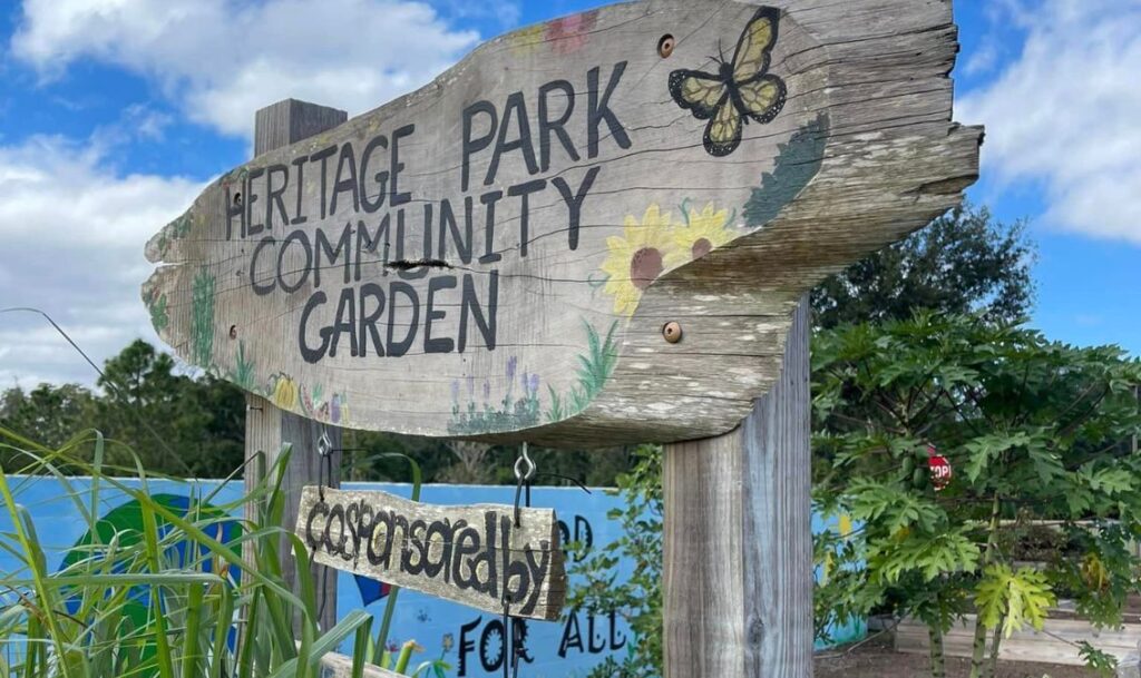 land o lakes heritage park's community garden sign